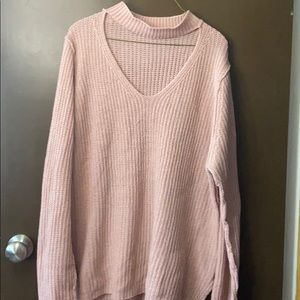 Pink V-neck knit sweater